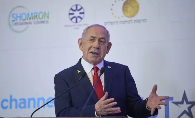 Israeli Prime Minister Benjamin Netanyahu speaks to the audience at a conference in Jerusalem, Sunday, July 27, 2025. (AP Photo/Ohad Zwigenberg)