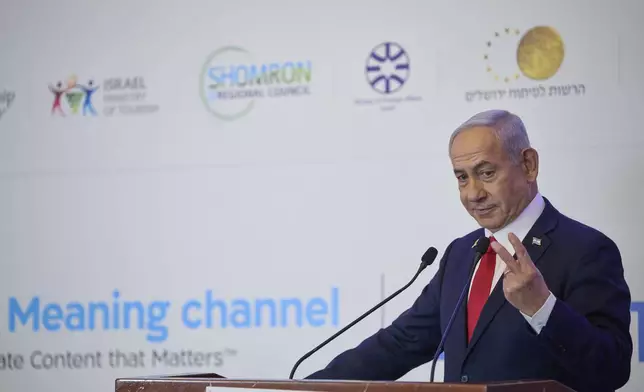 Israeli Prime Minister Benjamin Netanyahu speaks to the audience at a conference in Jerusalem, Sunday, July 27, 2025. (AP Photo/Ohad Zwigenberg)