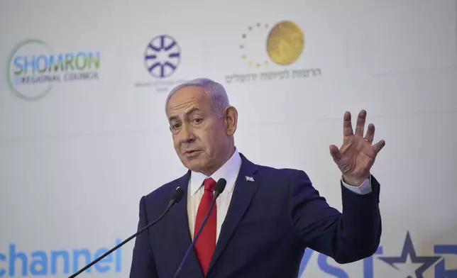 Israeli Prime Minister Benjamin Netanyahu speaks to the audience at a conference in Jerusalem, Sunday, July 27, 2025. (AP Photo/Ohad Zwigenberg)