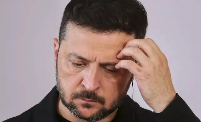 FILE - Ukraine's President Volodymyr Zelenskyy attends a press conference during his visit to Vienna, Austria, June 16, 2025. (AP Photo/Heinz-Peter Bader, File)