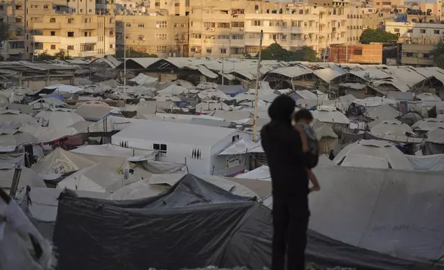 A tent camp for displaced Palestinians stretches along Gaza City, Sunday, Aug. 3, 2025. (AP Photo/Jehad Alshrafi)