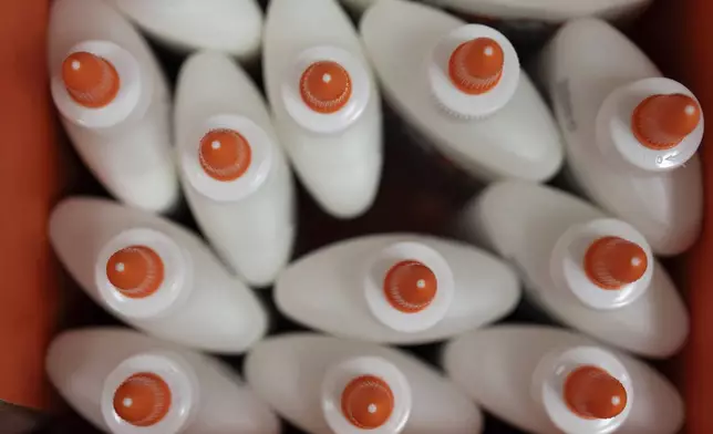 Glue is seen in a back-to-school supplies section of a Target in Sherwood, Ore., Friday, Aug. 8, 2025. (AP Photo/Jenny Kane)