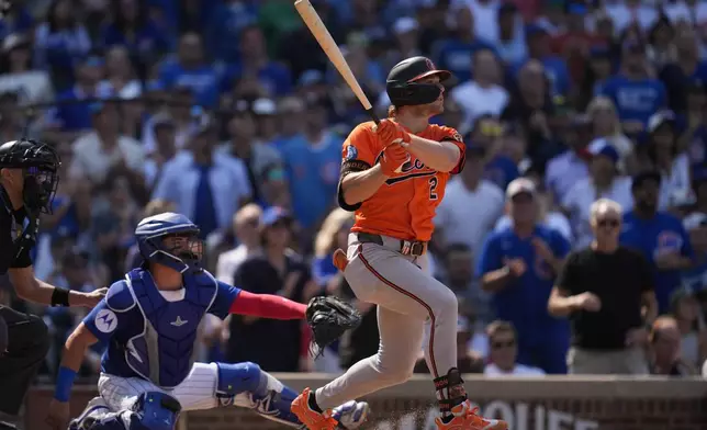Baltimore Orioles' Gunnar Henderson (2) hits a three-run home run during the eighth inning of a baseball game against the Chicago Cubs, Saturday, Aug. 2, 2025, in Chicago. (AP Photo/Erin Hooley)