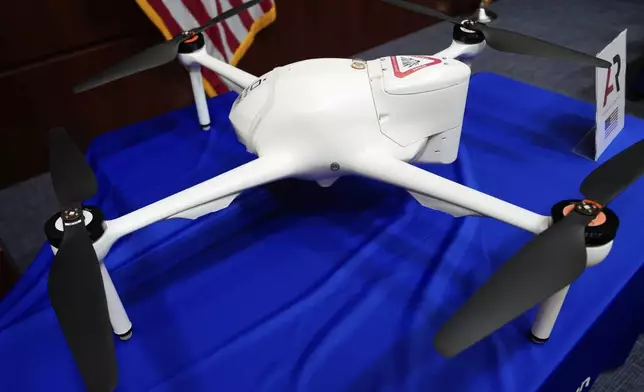 A drone is displayed before a news conference at the Department of Transportation on new drone regulations, Tuesday, Aug. 5, 2025, in Washington. (AP Photo/Julia Demaree Nikhinson)