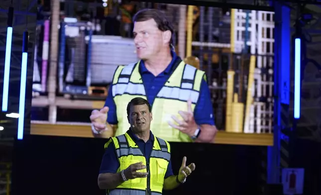 Ford CEO Jim Farley speaks at the Louisville Assembly Plant, Monday, Aug. 11, 2025, in Louisville, Ky. (AP Photo/Darron Cummings)
