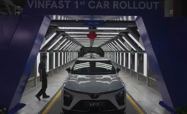 A VinFast VF 7 electric vehicle model is seen at the plant in Thoothukudi, in the southern Indian state of Tamil Nadu, Monday, Aug. 4, 2025. (AP Photo/ Rafiq Maqbool)