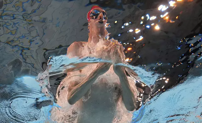 Max Litchfield of Great Britain competes in the men's 400-meter individual medley heats at the World Aquatics Championships in Singapore, Aug. 3, 2025. (AP Photo/Lee Jin-man)