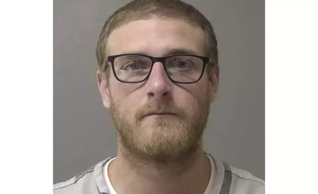 FILE - This January 2025 booking photo provided by the Macon County jail shows Sean Grayson, a former Sangamon County Sheriff's deputy who is charged with first-degree murder in the shooting death of Sonya Massey in Springfield, Ill. (Macon County Jail via AP,File)