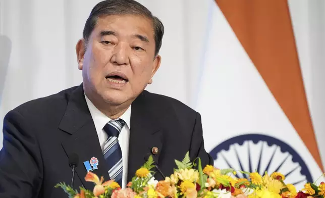 Japanese Prime Minister Shigeru Ishiba delivers a speech during the Japan India Economic Forum in Tokyo Friday, Aug. 29, 2025. (AP Photo/Eugene Hoshiko)