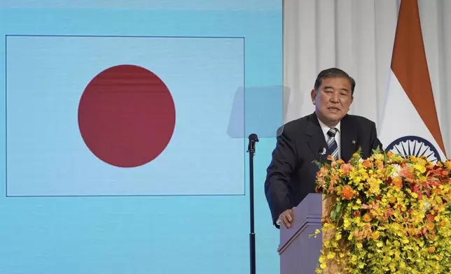 Japanese Prime Minister Shigeru Ishiba delivers a speech during the Japan India Economic Forum in Tokyo Friday, Aug. 29, 2025. (AP Photo/Eugene Hoshiko)
