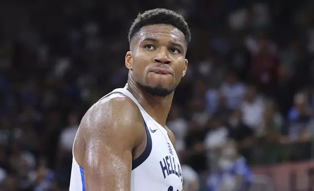 Greece's Giannis Antetokounmpo reacts after his team won Italy during the Eurobasket, European Basketball Championship Group C match between Greece and Italy at the Spyros Kyprianou Arena in Limassol, Cyprus, Thursday, Aug. 28, 2025. (AP Photo/Chara Savvidou)