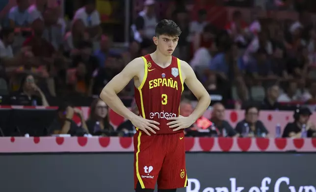 Spain's Sergio De Larrea reacts during the Eurobasket, European Basketball Championship Group C match between Spain and Georgia at the Spyros Kyprianou Arena in Limassol, Cyprus, Thursday, Aug. 28, 2025. (AP Photo/Chara Savvidou)