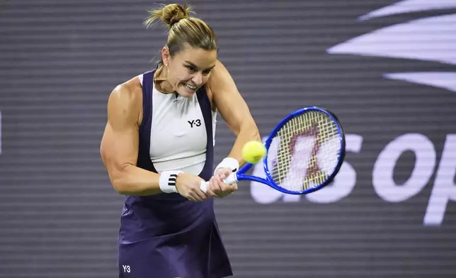Maria Sakkari, of Greece, returns a shot against Beatriz Haddad Maia, of Brazil, during the third round of the U.S. Open tennis championships, Saturday, Aug. 30, 2025, in New York. (AP Photo/Pamela Smith)