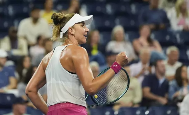 Beatriz Haddad Maia, of Brazil, reacts after winning the first set against Maria Sakkari, of Greece, during the third round of the U.S. Open tennis championships, Saturday, Aug. 30, 2025, in New York. (AP Photo/Pamela Smith)