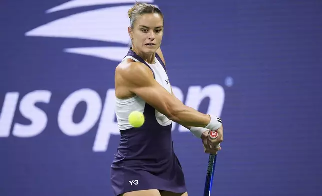 Maria Sakkari, of Greece, returns a shot against Beatriz Haddad Maia, of Brazil, during the third round of the U.S. Open tennis championships, Saturday, Aug. 30, 2025, in New York. (AP Photo/Pamela Smith)