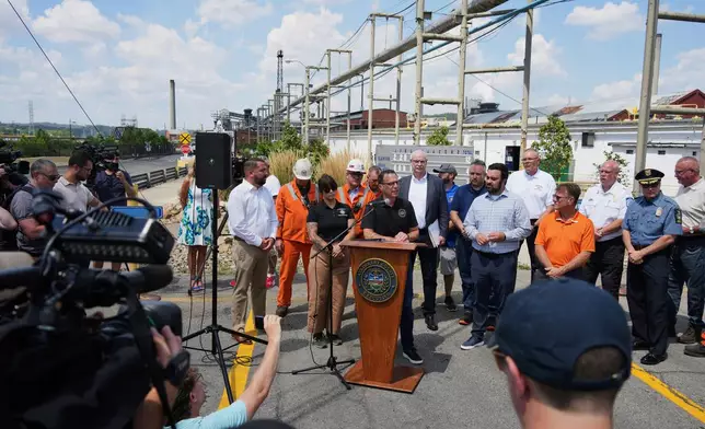 Pennsylvania Governor Josh Shapiro talks with media at the Clairton Coke Works, a U.S. Steel plant, in Clairton, Pa., Tuesday, Aug. 12, 2025. (AP Photo/Gene J. Puskar)