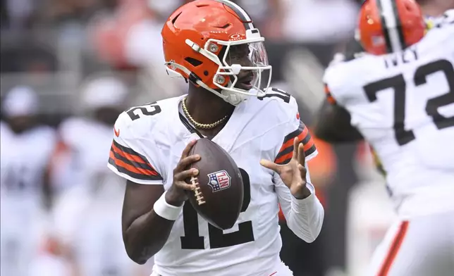 Cleveland Browns quarterback Shedeur Sanders (12) looks to pass against the Los Angeles Rams in the second half of an NFL preseason football game Saturday, Aug. 23, 2025, in Cleveland. (AP Photo/David Richard)