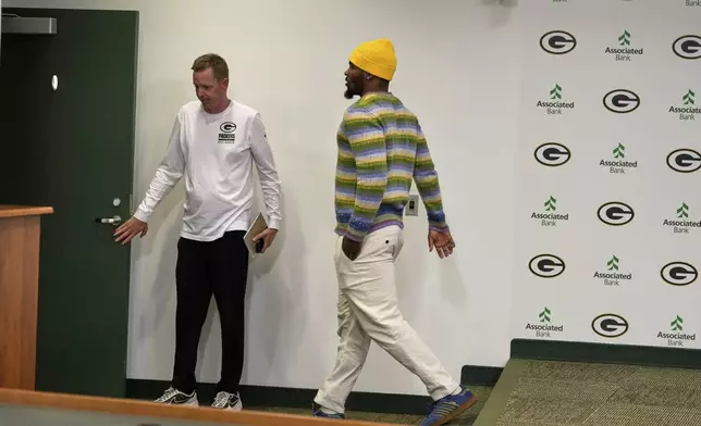 Green Bay Packers Micah Parsons leaves after his introductory news conference Friday, Aug. 29, 2025, in Green Bay, Wis. (AP Photo/Morry Gash)