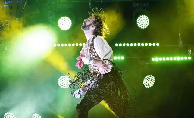 FILE - Winner Rob Messel 'The Marquis' of the U.S performs during the Air Guitar World Championships final in Oulu, Finland on Friday Aug. 23 2019. (Eeva Riihela/Lehtikuva via AP, file)