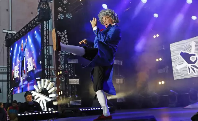 Patrick Culek "Van Airhoven" of Germany performs during the Air Guitar World Championships final in Oulu, Finland, Friday Aug. 22, 2025. (Eeva Riihela/Lehtikuva via AP)