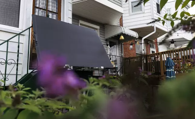 A solar panel fromBright Saver sits at Craig Keenan's home Friday, Aug. 1, 2025, in Baltimore. (AP Photo/KT Kanazawich)