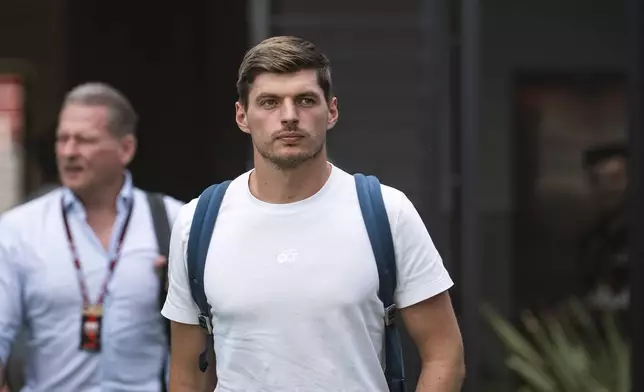 Red Bull driver Max Verstappen of the Netherlands walks in the paddock ahead of the Formula One Hungarian Grand Prix at the Hungaroring racetrack in Mogyorod near Budapest, Hungary, Thursday, July 31, 2025. (Boglarka Bodnar/MTI via AP)