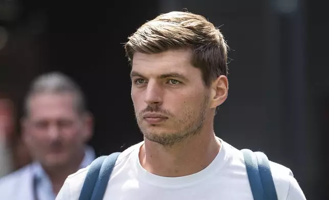Red Bull driver Max Verstappen of the Netherlands walks in the paddock ahead of the Formula One Hungarian Grand Prix at the Hungaroring racetrack in Mogyorod near Budapest, Hungary, Thursday, July 31, 2025. (Boglarka Bodnar/MTI via AP)