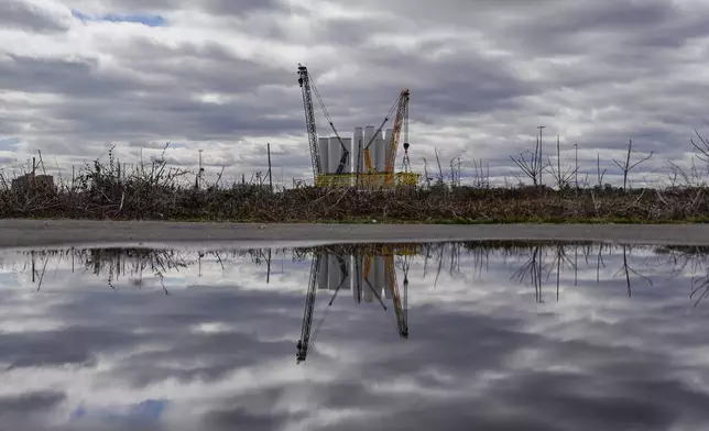 FILE - Wind turbine components sit at New London State Pier, April 16, 2025, in New London, Conn. (AP Photo/Julia Demaree Nikhinson, File)