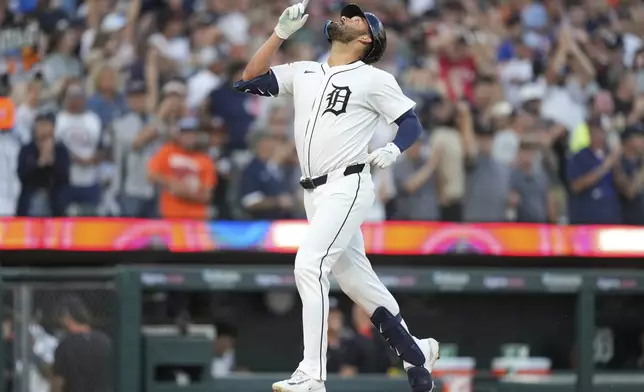 Detroit Tigers designated hitter Riley Greene gestures while running the bases after hitting a two-run home run during the fifth inning of a baseball game against the Houston Astros, Monday, Aug. 18, 2025, in Detroit. (AP Photo/Ryan Sun)