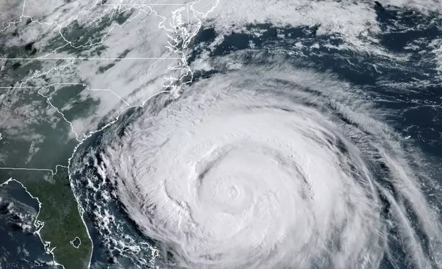 This image provided by the National Oceanic and Atmospheric Administration (NOAA) shows Hurricane Erin on Wednesday, Aug. 20, 2025. (NOAA via AP)
