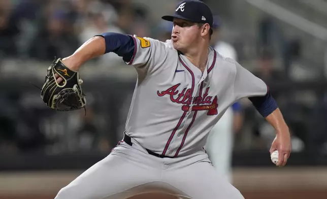 Atlanta Braves' Austin Cox pitches during the fifth inning of a baseball game against the New York Mets Tuesday, Aug. 12, 2025, in New York. (AP Photo/Frank Franklin II)