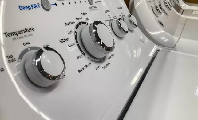 FILE - A General Electric washer sits inside a retailer, Sept. 15, 2023, in Marietta, Ga. (AP Photo/Mike Stewart, File)
