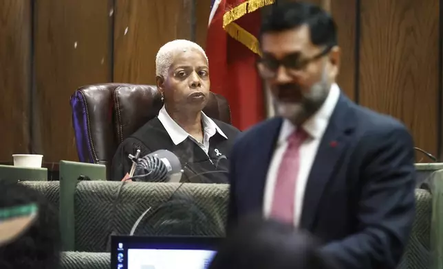 Shelby County Judge Jennifer Mitchell, left, listens to opening statement during the murder trial Hernandez Govan, who is accused of orchestrating the killing of rapper Young Dolph in Memphis, Tenn., on Monday, Aug. 18, 2025. (Mark Weber/Daily Memphian via AP, Pool)