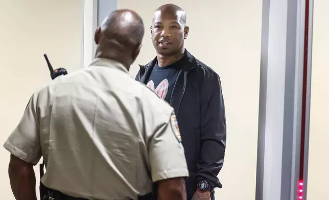FILE - Defendant Hernandez Govan tries to enter court during the murder trial of rapper Young Dolph in Memphis, Tenn., Sept. 23, 2024. (Mark Weber/Daily Memphian via AP, Pool, File)