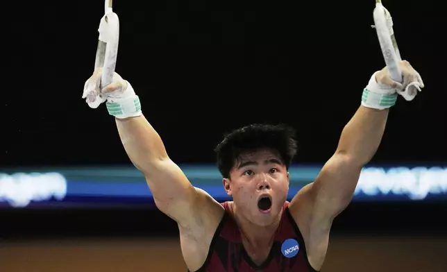 Asher Hong of Stanford University competes on the rings during the senior men's finals of the U.S. Gymnastics Championships in New Orleans, Saturday, Aug. 9, 2025. (AP Photo/Gerald Herbert)