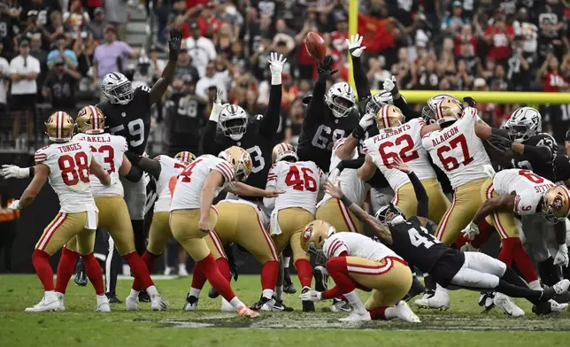 San Francisco 49ers place kicker Jake Moody (4) makes the game-winning field goal during a preseason NFL football game against the Las Vegas Raiders, Saturday, Aug. 16, 2025, in Las Vegas. (AP Photo/David Becker)