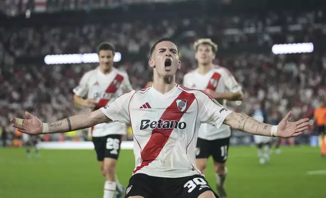 FILE - Franco Mastantuono of Argentina's River Plate celebrates after scoring from the penalty spot his side's third goal against Ecuador's Independiente del Valle during a Copa Libertadores Group B soccer match at the Monumental stadium in Buenos Aires, Argentina, Thursday, May 15, 2025. (AP Photo/Gustavo Garello, File)