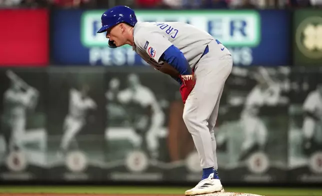 Chicago Cubs' Pete Crow-Armstrong reacts after being picked off second during the fourth inning of a baseball game against the St. Louis Cardinals Sunday, Aug. 10, 2025, in St. Louis. (AP Photo/Jeff Roberson)