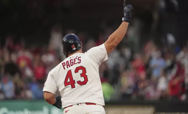 St. Louis Cardinals' Pedro Pages celebrates after hitting a two-run home run during the third inning of a baseball game against the Chicago Cubs Sunday, Aug. 10, 2025, in St. Louis. (AP Photo/Jeff Roberson)