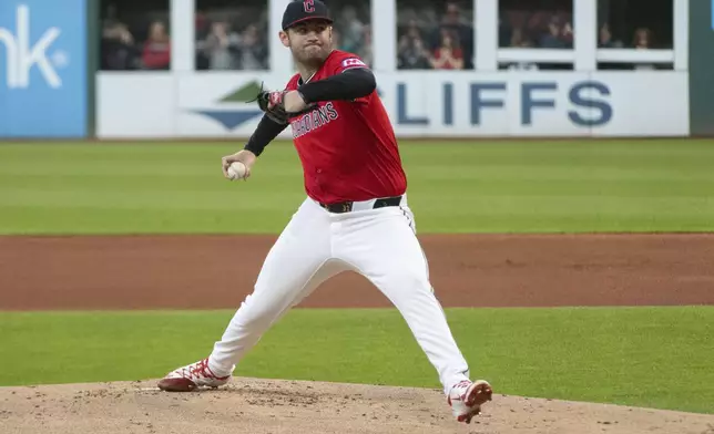 Cleveland Guardians starting pitcher Gavin Williams delivers against the Seattle Mariners during the first inning of a baseball game, Saturday, Aug. 30, 2025, in Cleveland. (AP Photo/Phil Long)