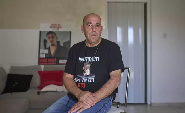Ofir Braslavski, whose son Rom was abducted by Hamas militants on Oct. 7, 2023, poses for a portrait in Almon an Israeli settlement in the West Bank, Monday, Aug. 04, 2025. (AP Photo/Ohad Zwigenberg)