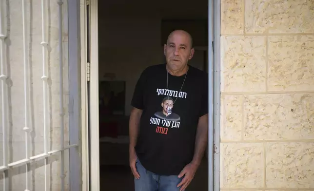 Ofir Braslavski, whose son Rom was abducted by Hamas militants on Oct. 7, 2023, poses for a portrait in Almon an Israeli settlement in the West Bank, Monday, Aug. 04, 2025. (AP Photo/Ohad Zwigenberg)