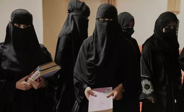 Afghan girls attend a religious studies class at the Tasnim-e-Nusrat religious education center in Kabul, Afghanistan, Wednesday, May 28, 2025. (AP Photo/Ebrahim Noroozi)