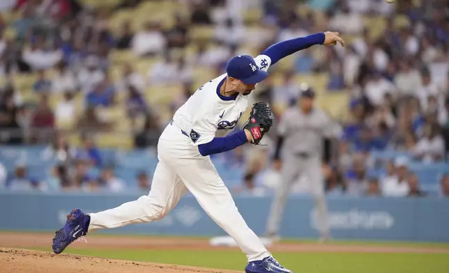 Los Angeles Dodgers starting pitcher Blake Snell throws to the plate during the first inning of a baseball game against the Arizona Diamondbacks, Friday, Aug. 29, 2025, in Los Angeles. (AP Photo/Mark J. Terrill)