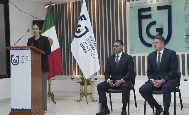 Mexico City Attorney General Bertha Alcalde Lujan, left, Mexico City Security Secretary Pablo Vázquez Camacho, right, and the country's Secretary of Security and Citizen Protection Omar García Harfuch give a press conference on the arrest of those involved in the murder of two of Mexico City Mayor Clara Brugada's aides, Wednesday, Aug. 20, 2025. (AP Photo/Marco Ugarte)
