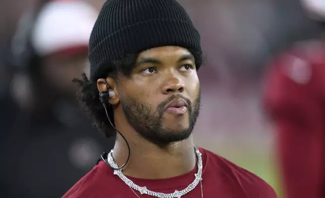 Arizona Cardinals quarterback Kyler Murray watches from the sidelines during the first half of an NFL preseason football game, Saturday, Aug. 23, 2025, in Glendale. (AP Photo/Ross D. Franklin)