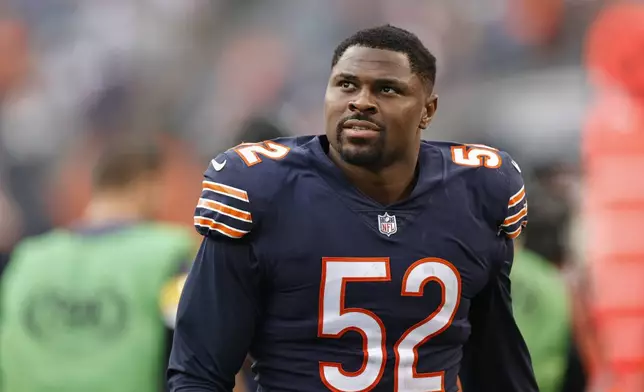 FILE - Chicago Bears outside linebacker Khalil Mack (52) walks off the field after an NFL football game against the Detroit Lions, Oct. 3, 2021, in Chicago. (AP Photo/Kamil Krzaczynski, File)