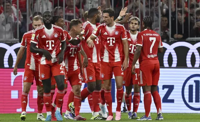 Bayern Munich's Luis Díaz, 2nd right, celebrates scoring during the Bundesliga soccer match between Bayern Munich and RB Leipzig at Allianz Arena, Munich, Germany, Friday Aug. 22, 2025. (Sven Hoppe/dpa via AP)