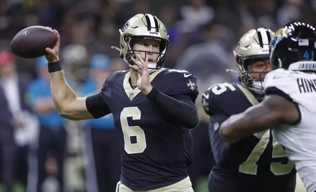 New Orleans Saints quarterback Tyler Shough (6) throws a pass against the Jacksonville Jaguars in the first half of an NFL preseason football game in New Orleans, Sunday, Aug. 17, 2025. (AP Photo/Butch Dill)
