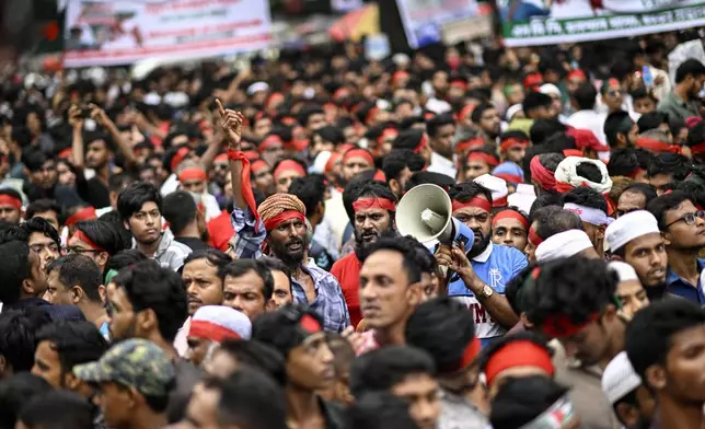 Supporters of National Citizen Party (NCP) shout slogans during a political rally in Dhaka, Bangladesh, Sunday, Aug. 3, 2025. (AP Photo/Mahmud Hossain Opu)